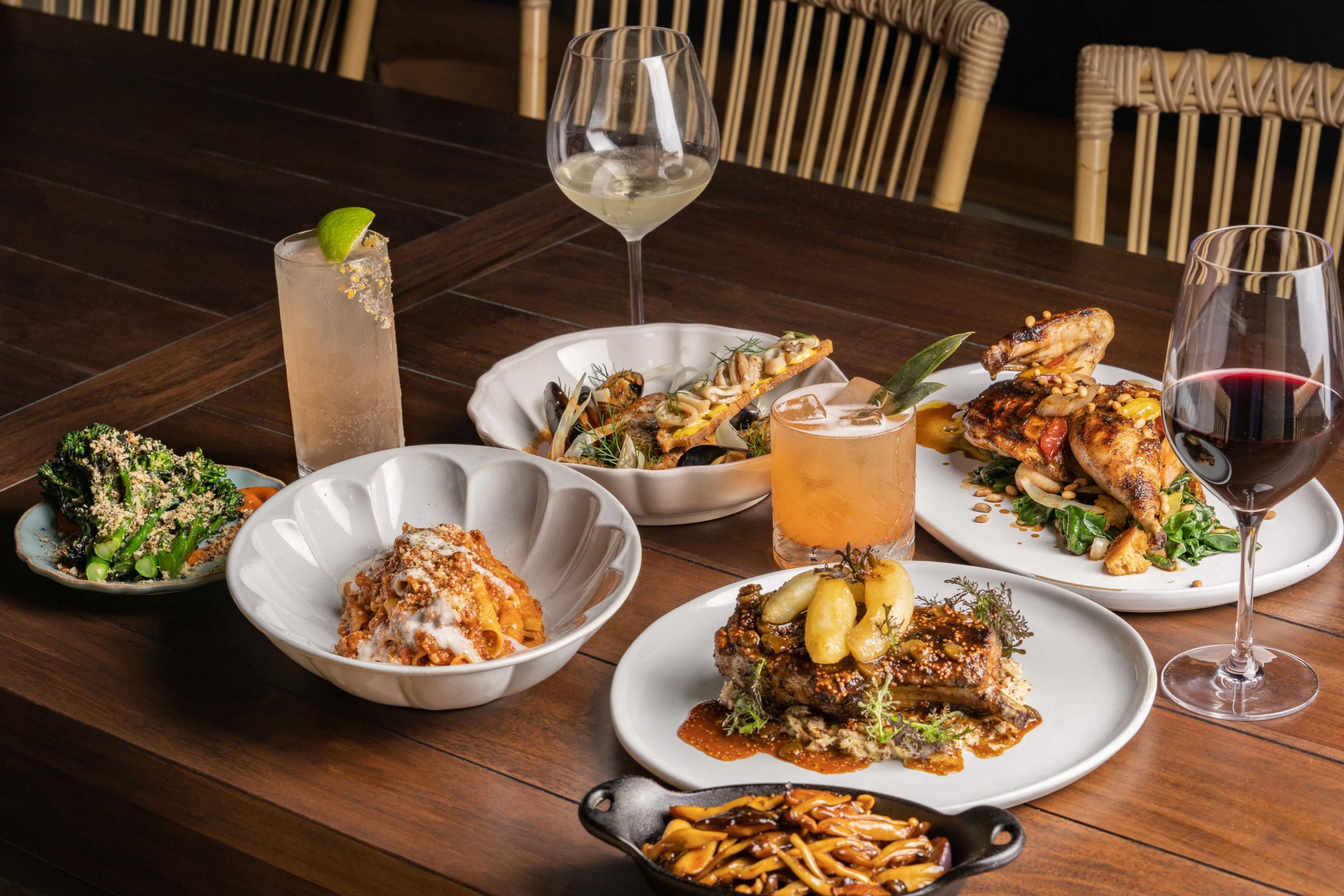 Crispy-Skin Striped Bass Wood-Fired Petaluma Chicken Charred Broccolini Garganelli Bolognese Charcoal-Grilled Heritage Pork Chop Roasted King Trumpet Mushrooms Mr.